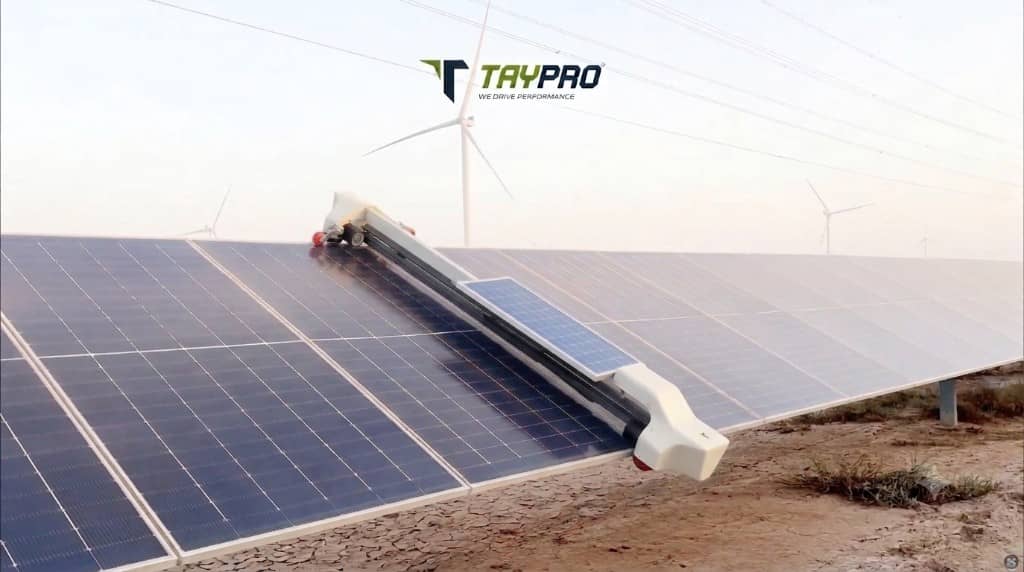 NYUMA-X solar panel cleaning robot on a utility-scale solar plant